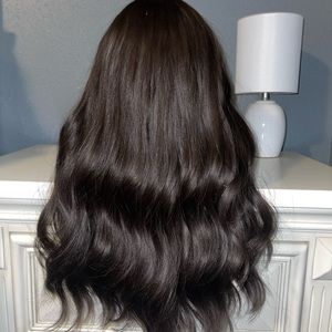 New synthetic wig long wavy with bangs. Natural dark brown. Heat resistant.